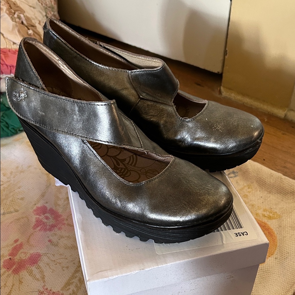 Fly London Women's Metallic Silver Wedges